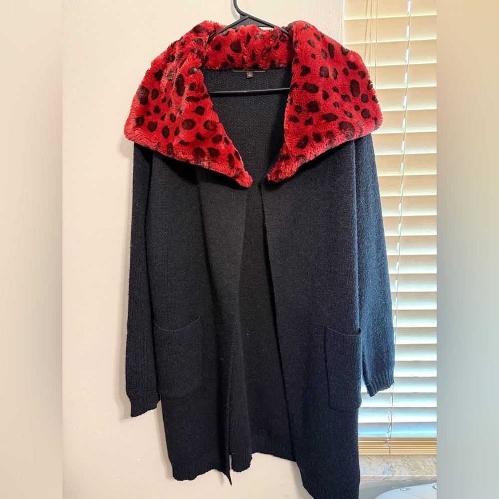 Max’s port Black Cardigan with Red Leopard Print Collar